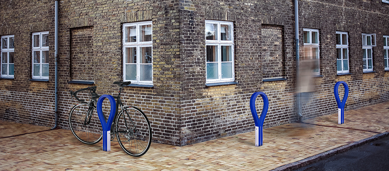 Illustration for article titled This Colorful Rubber Bike Rack Won't Scratch Or Ding Your Favorite Ride